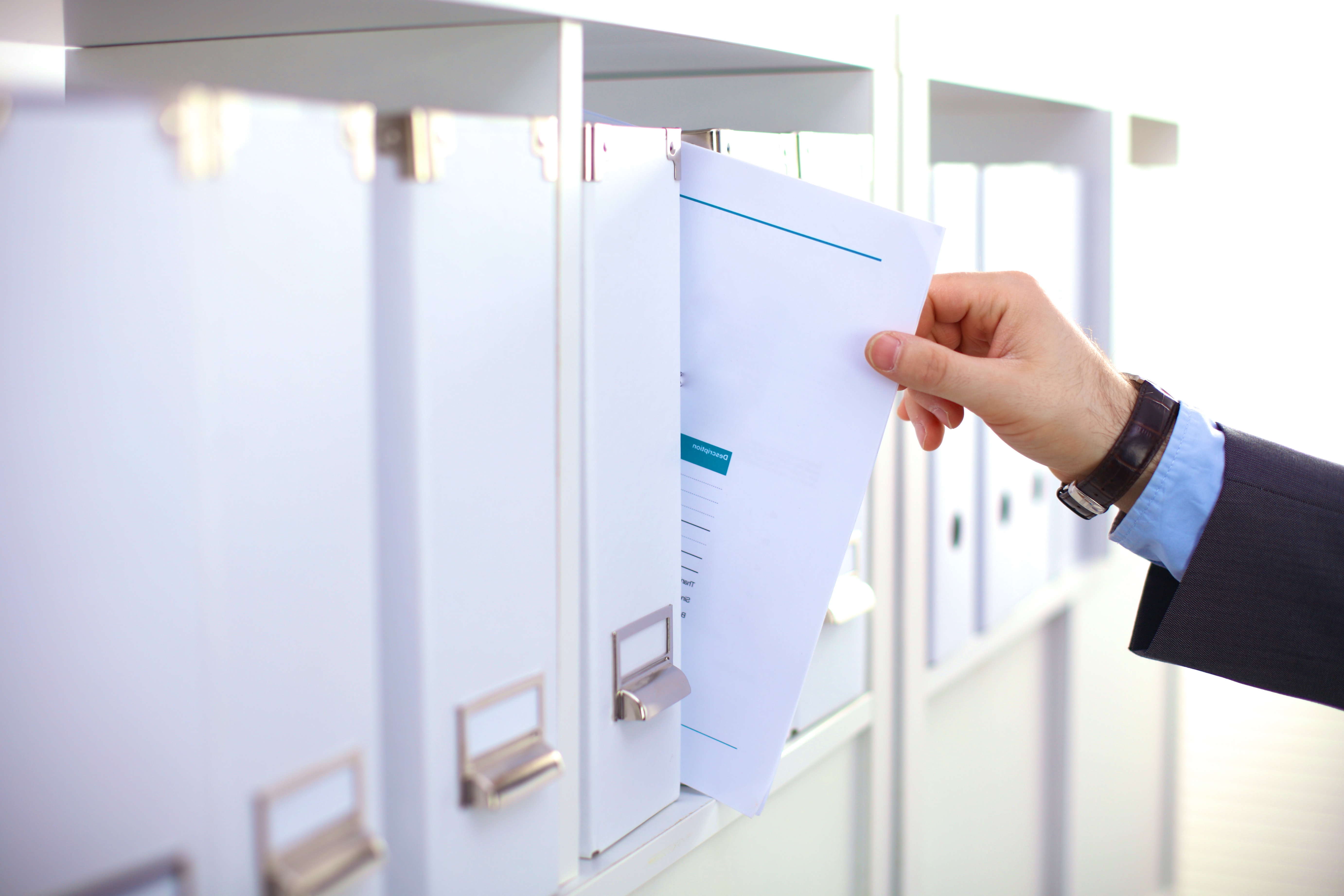 File folders, standing on shelves in the background, crosslead, company plan, strategic plan, washington dc